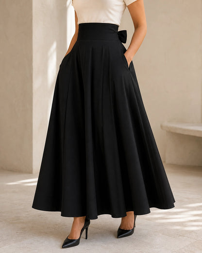 Hoch sitzender Damen-Midirock mit Schleife und Taschen — image 1