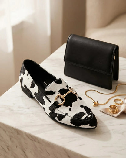 Octavia | Western Cow Print Buckle Flat Loafers — loafers-for-women-animal-print-slip-on-black-white-07-reference-view.webp
