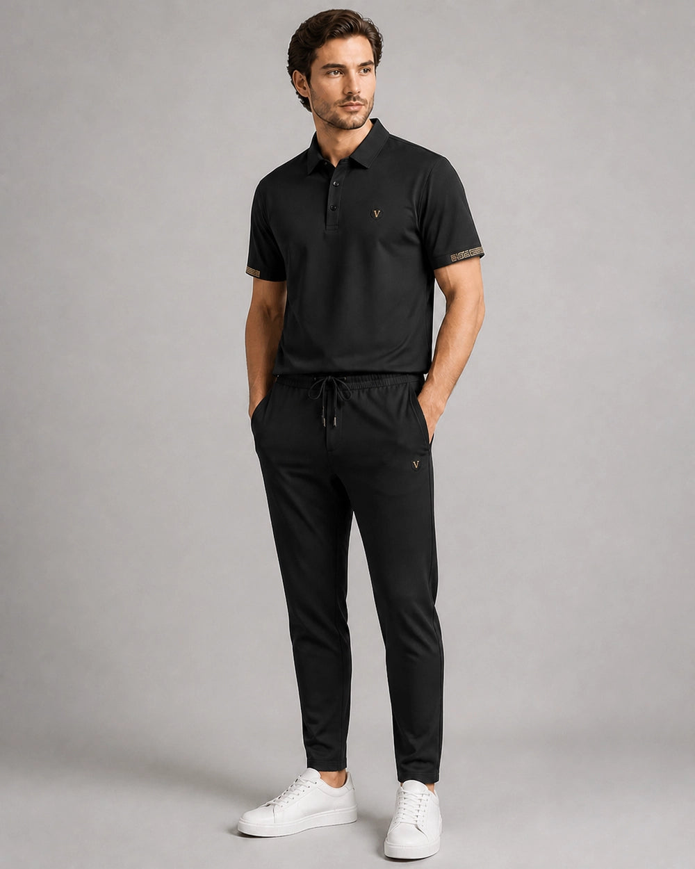 Black men's polo and trousers set worn, color view.