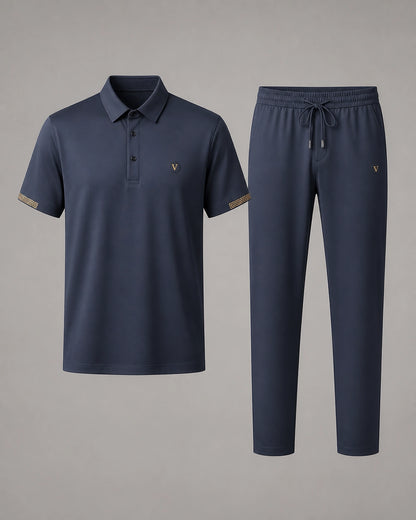 Blue men's polo shirt and matching trousers, product-only view.