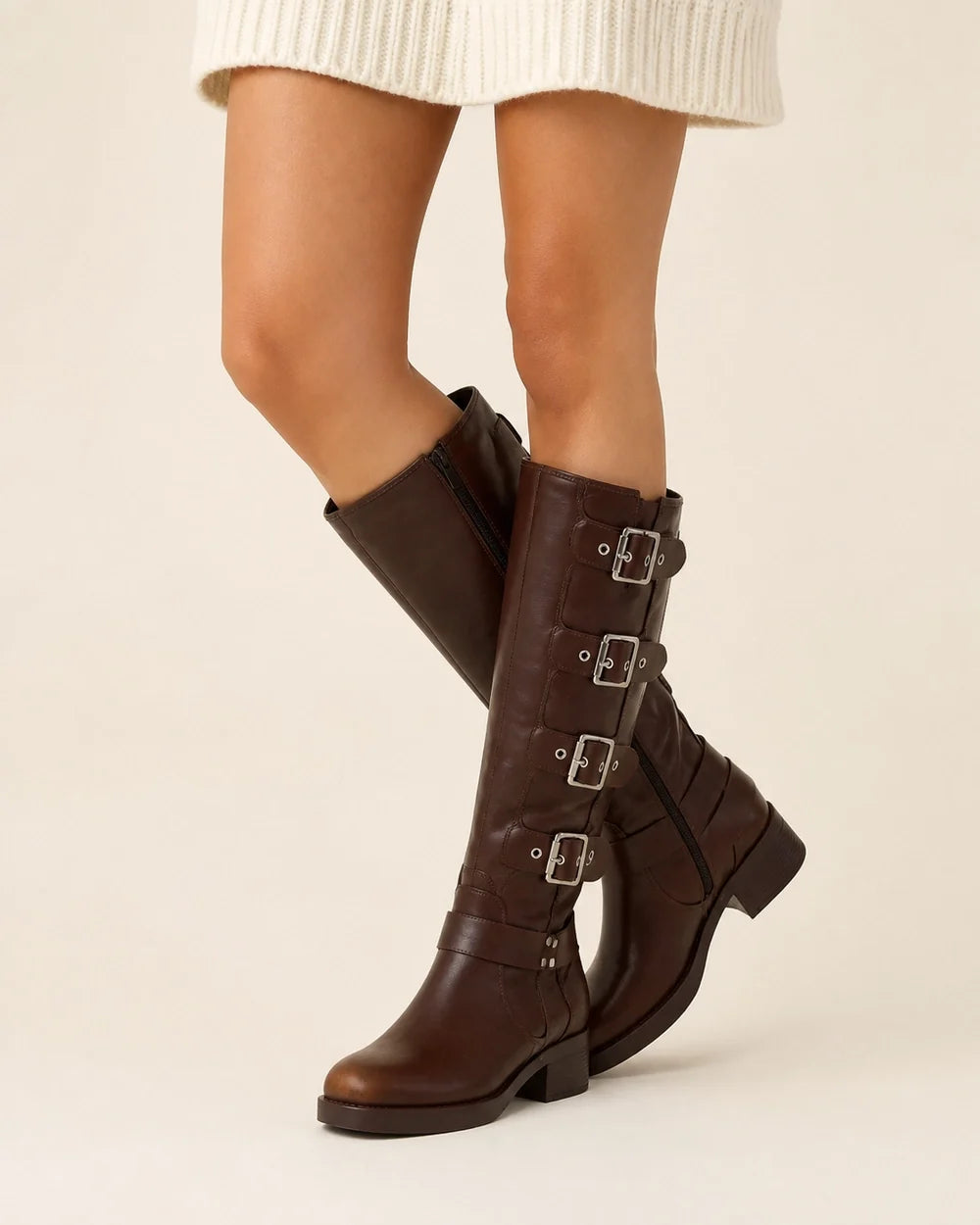 Brown knee-high multi-buckle biker boots worn zoomed hero