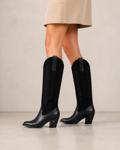 Jet-black leather and suede Western knee-high boots, profile view